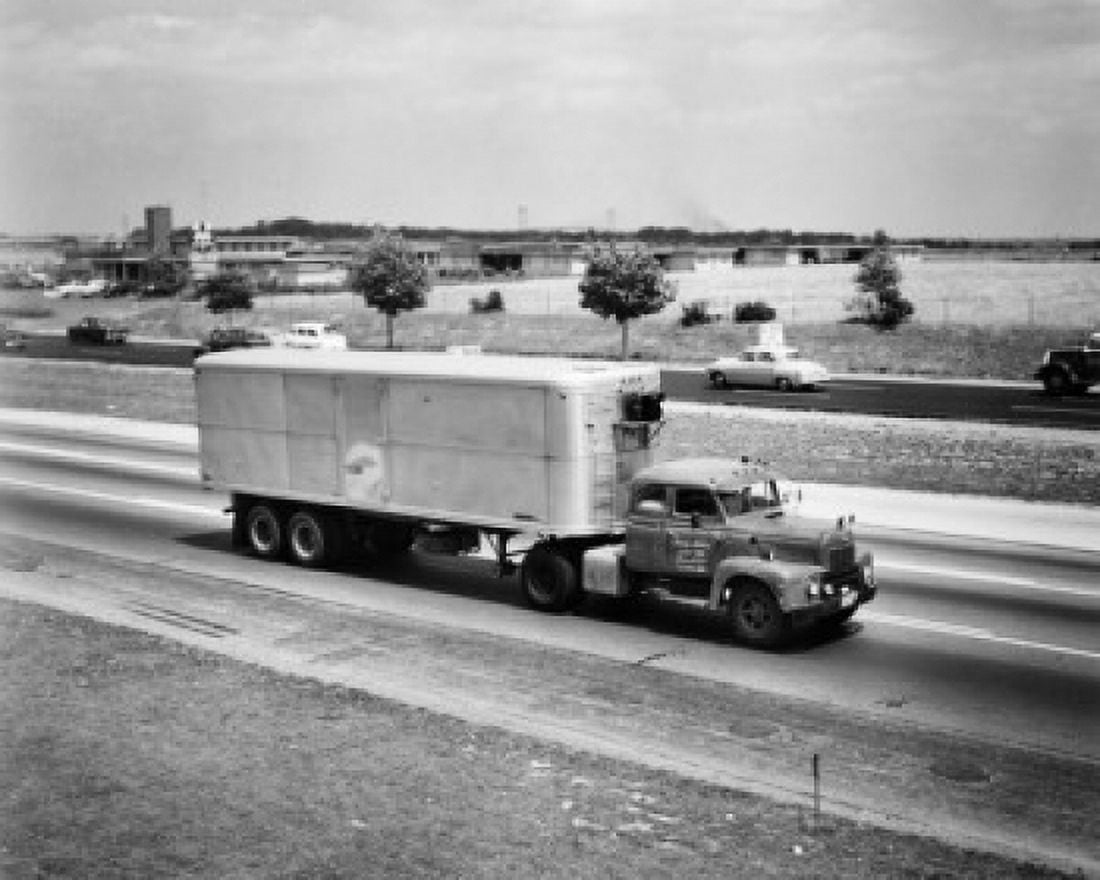 High angle view of a truck moving on a road Canvas Art - (18 x 24)