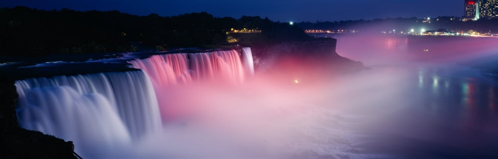 High angle view of a waterfall at night Niagara Falls New York State USA Canvas Art - Panoramic Images (27 x 9)