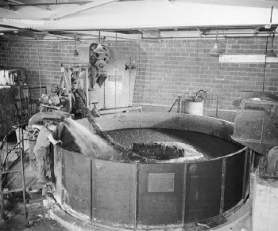 High angle view of a worker working in a paper mill Canvas Art - (18 x 24)
