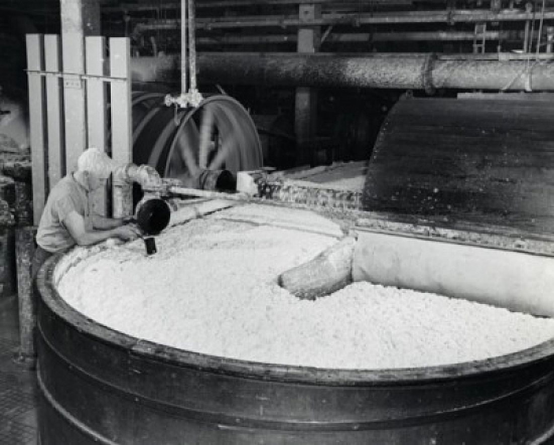 High angle view of a worker working in a paper mill Canvas Art - (24 x 36)