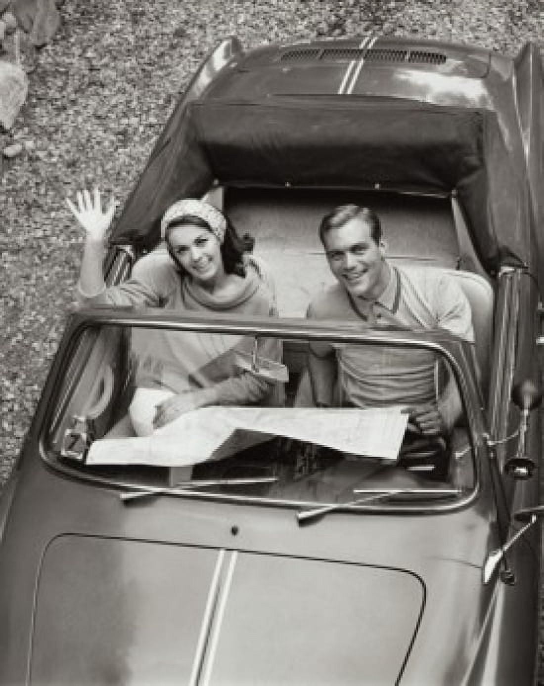 High angle view of a young couple sitting in a convertible car Canvas Art - (18 x 24)