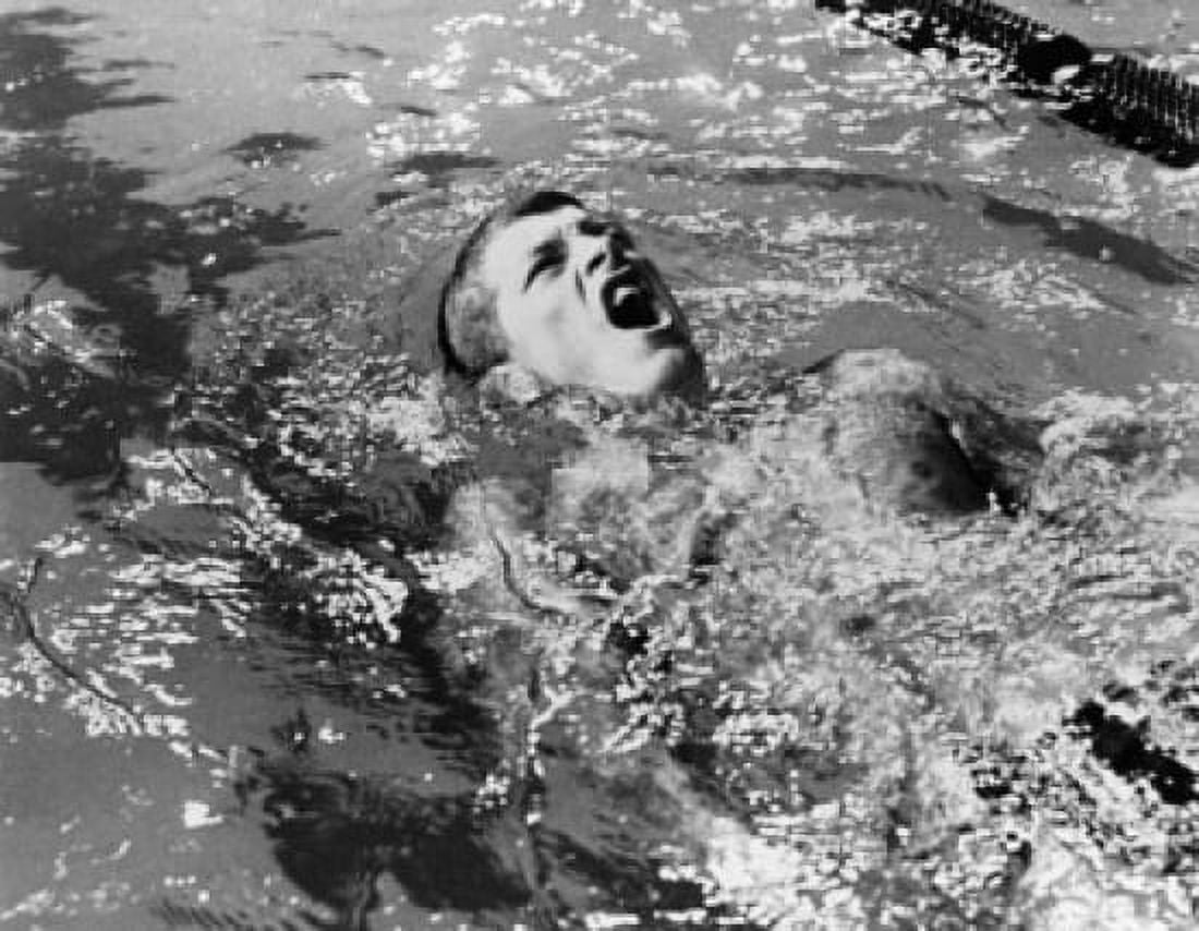High angle view of a young man swimming the backstroke in water Canvas Art - (18 x 24)