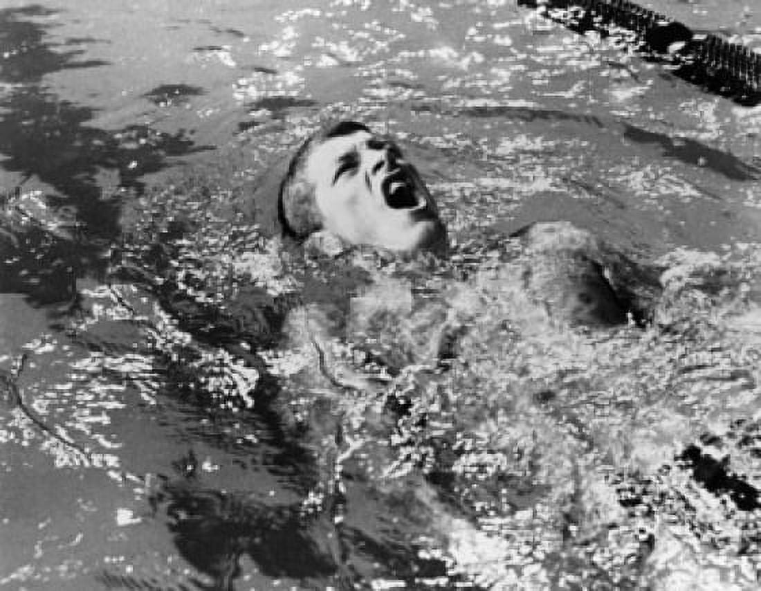 High angle view of a young man swimming the backstroke in water Canvas Art - (24 x 36)
