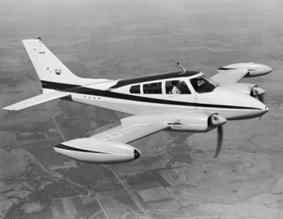 High angle view of an aircraft in flight Cessna 310F Canvas Art - (18 x 24)