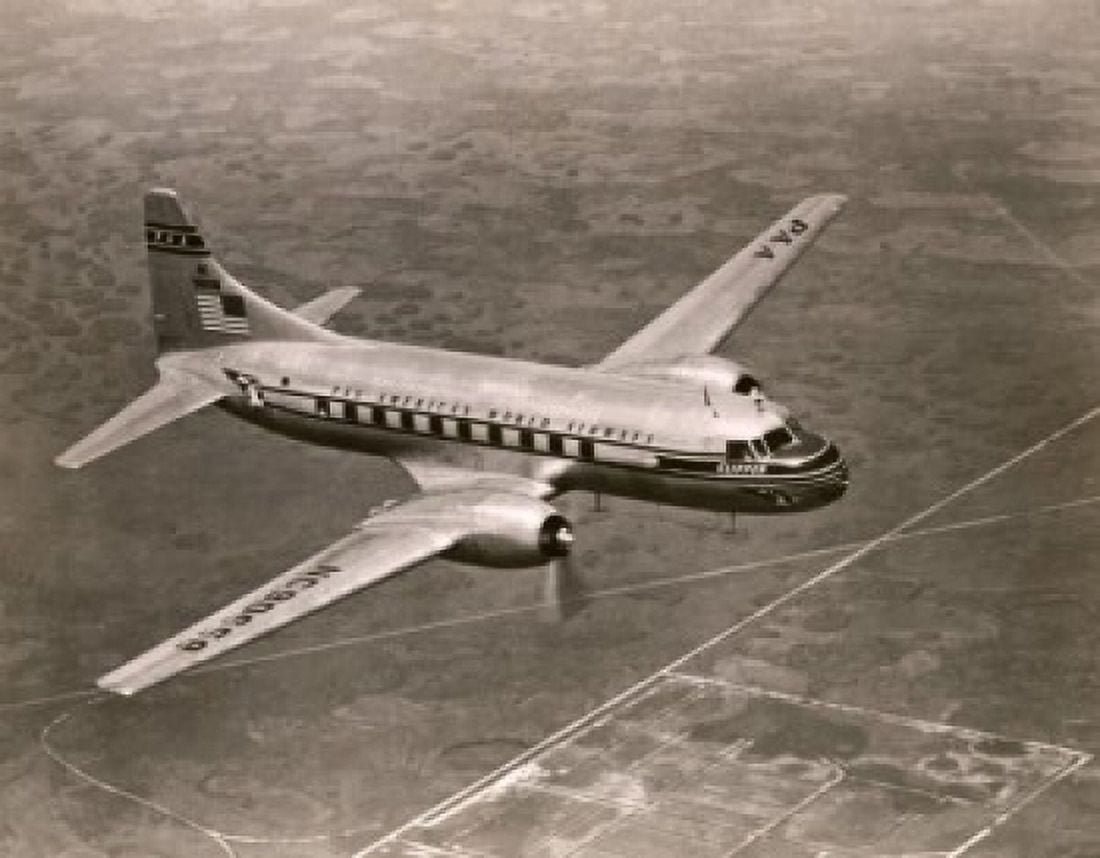 High angle view of an aircraft in flight Convair Twin Engine Clipper Pan American World Airways Canvas Art - (18 x 24)