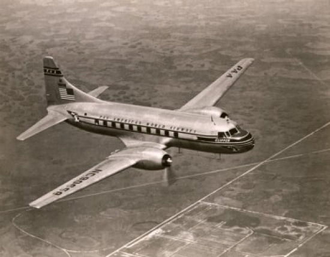 High angle view of an aircraft in flight Convair Twin Engine Clipper Pan American World Airways Canvas Art - (24 x 36)