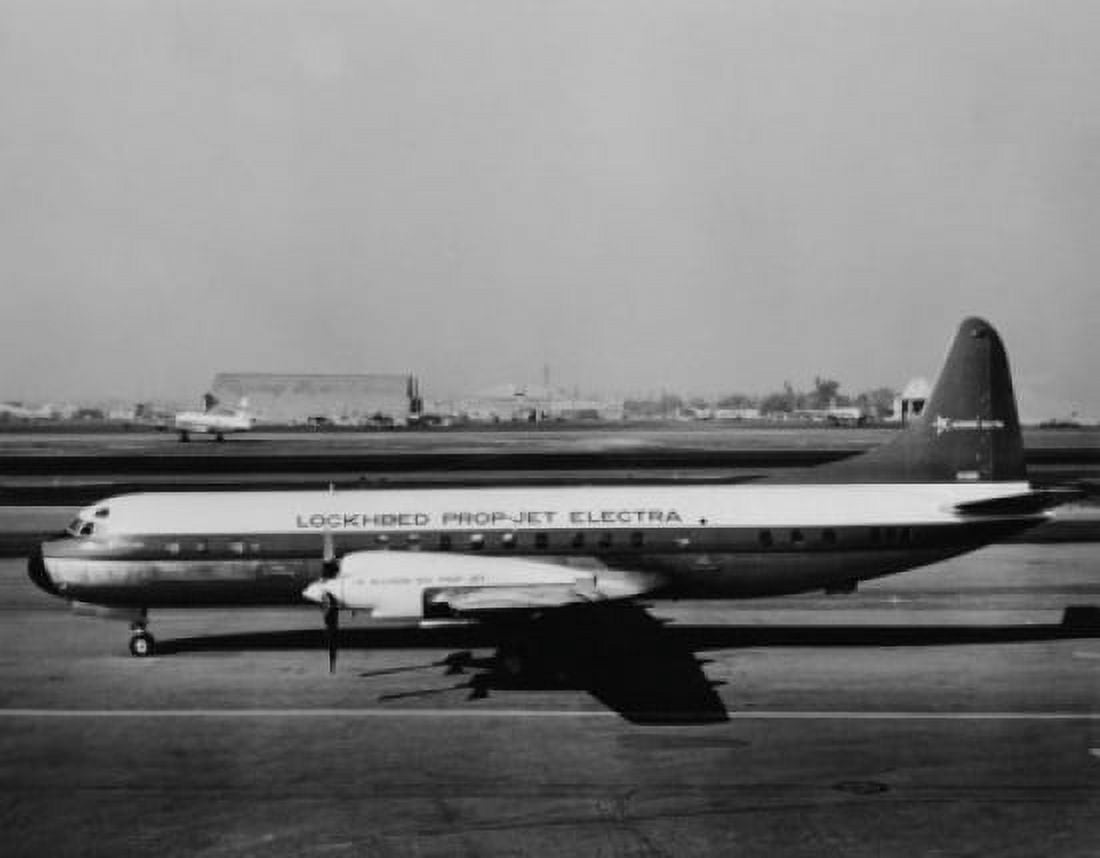 High angle view of an airplane at an airport Lockheed Prop-Jet Electra Canvas Art - (18 x 24)