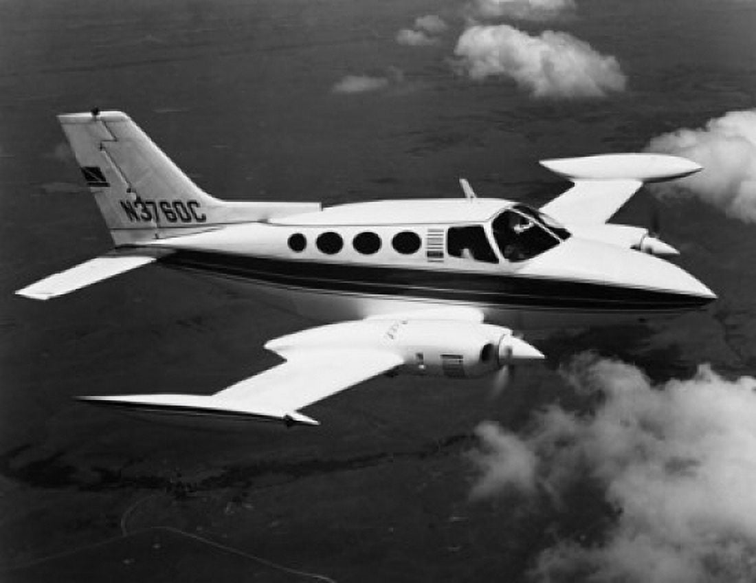 High angle view of an airplane in flight Canvas Art - (18 x 24)