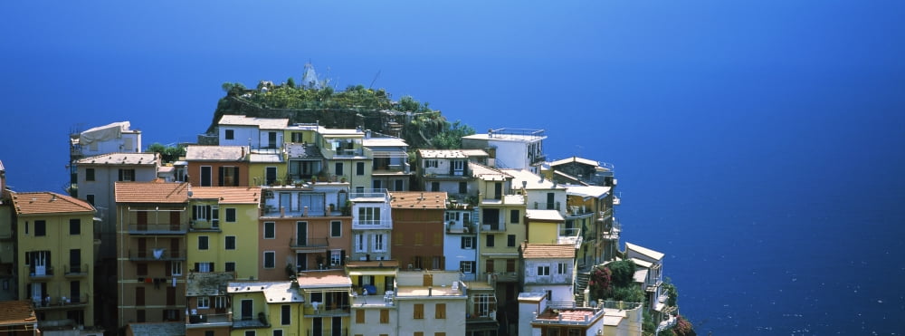 High angle view of buildings Manarola Cinque Terre Liguria Italy Canvas Art - Panoramic Images (27 x 9)