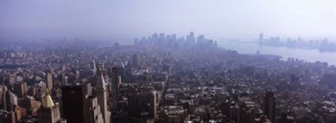 High angle view of buildings in a city Manhattan New York City New York State USA 2011 Canvas Art - Panoramic Images (18 x 7)