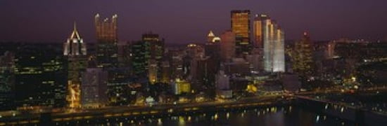 High angle view of buildings lit up at night Pittsburgh Pennsylvania USA Canvas Art - Panoramic Images (36 x 12)