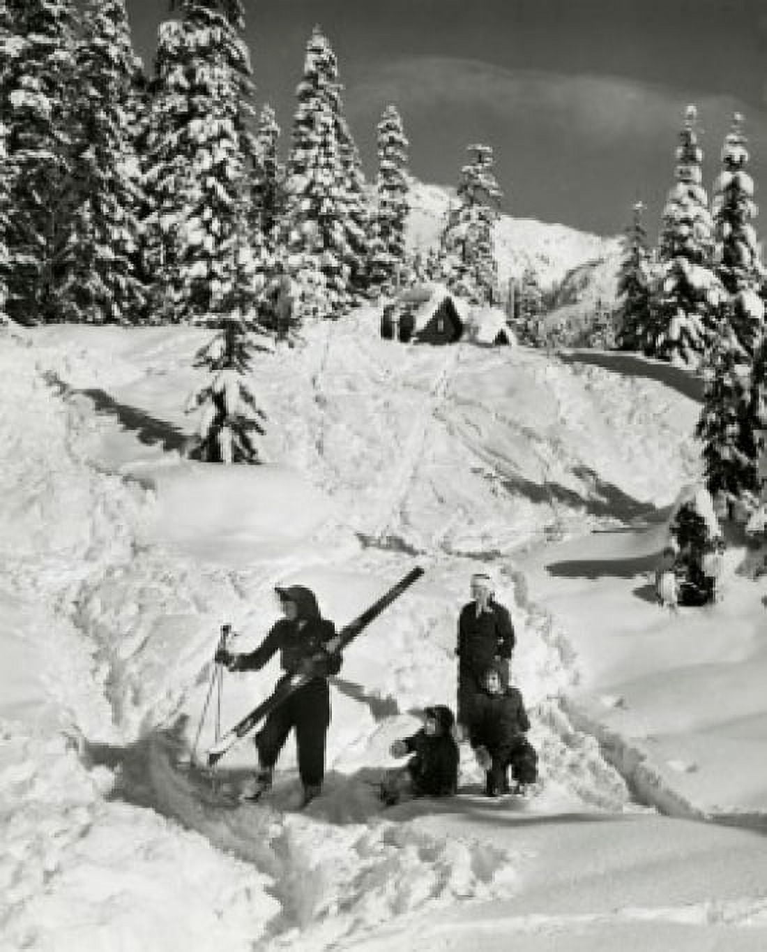 High angle view of parents and two children standing in snow Canvas Art - (24 x 36)