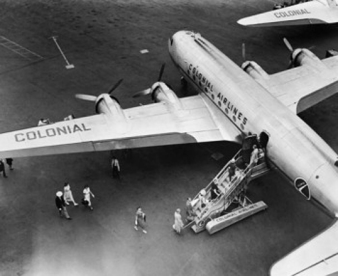 High angle view of passengers boarding an airplane Canvas Art - (18 x 24)