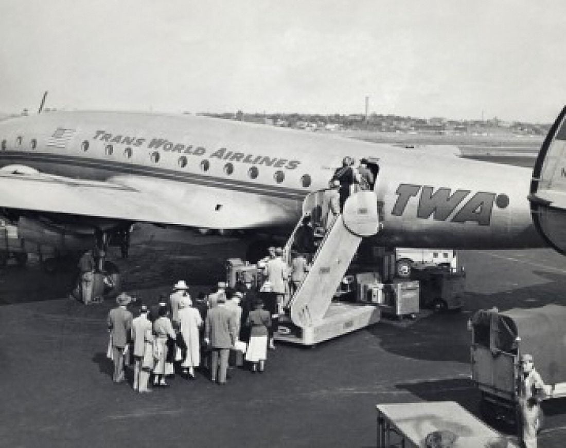 High angle view of passengers boarding an airplane Canvas Art - (24 x 36)