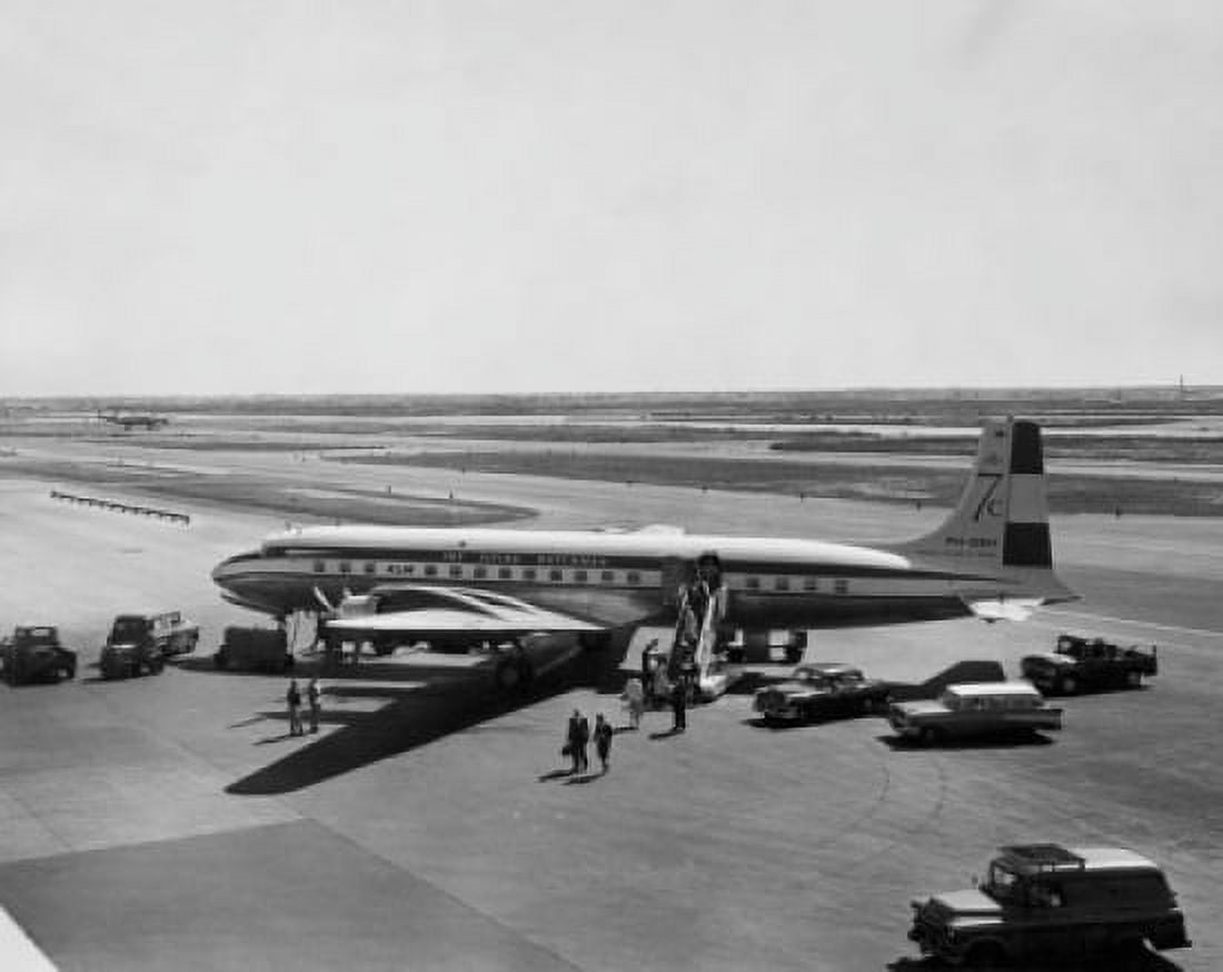 High angle view of passengers disembarking from an airplane Canvas Art - (24 x 36)