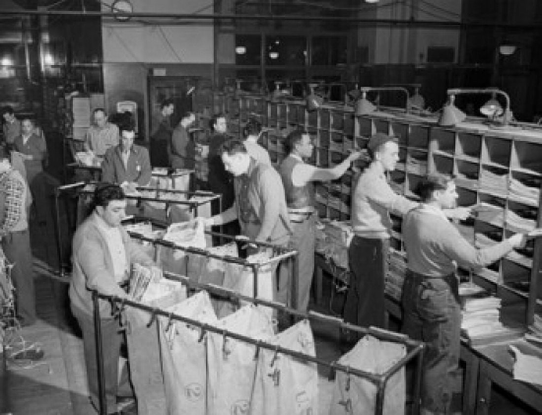 High angle view of postal workers sorting mail in a post office General Post Office New York City New York State USA Canvas Art - (24 x 36)