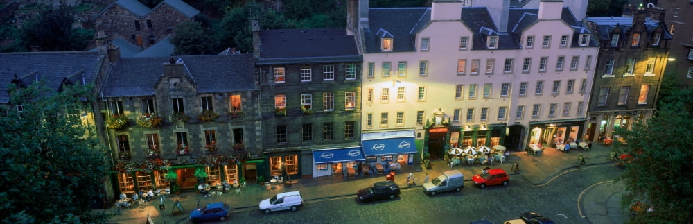 High angle view of pubs at dusk in Grassmarket Edinburgh Scotland Canvas Art - Panoramic Images (12 x 36)