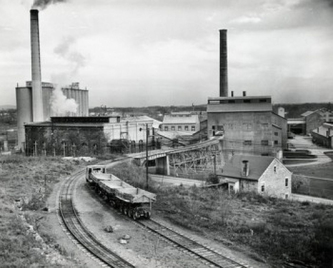 High angle view of rail road tracks leading towards a factory Canvas Art - (24 x 36)