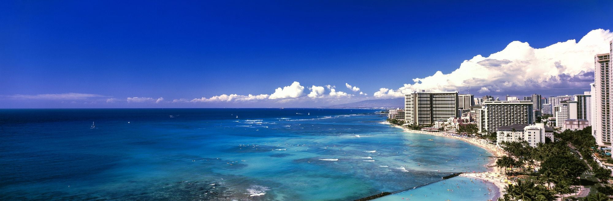 High angle view of skyscrapers at the waterfront Waikiki Beach Oahu Hawaii Islands Hawaii USA Canvas Art - Panoramic Images (6 x 18)