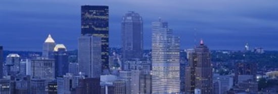 High angle view of skyscrapers lit up at dusk Pittsburgh Pennsylvania USA Canvas Art - Panoramic Images (36 x 13)
