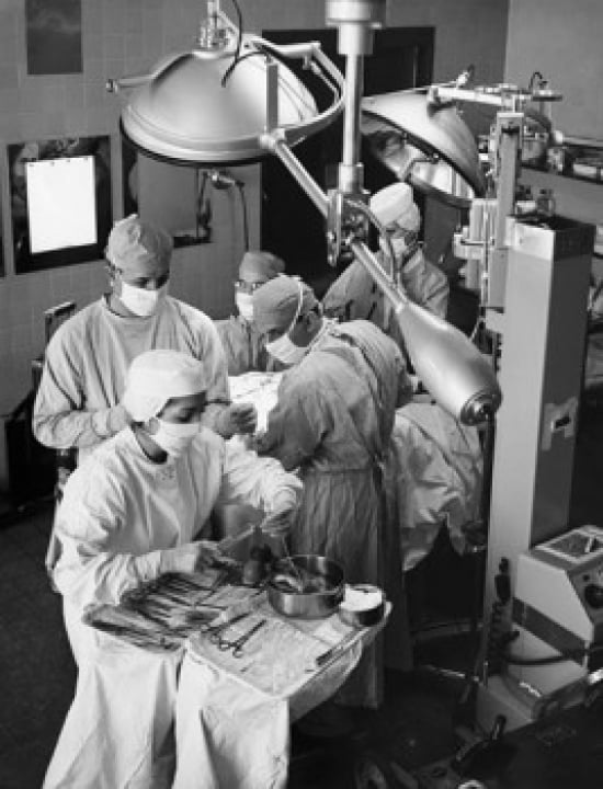 High angle view of surgeons performing a surgery in an operating room Canvas Art - (18 x 24)