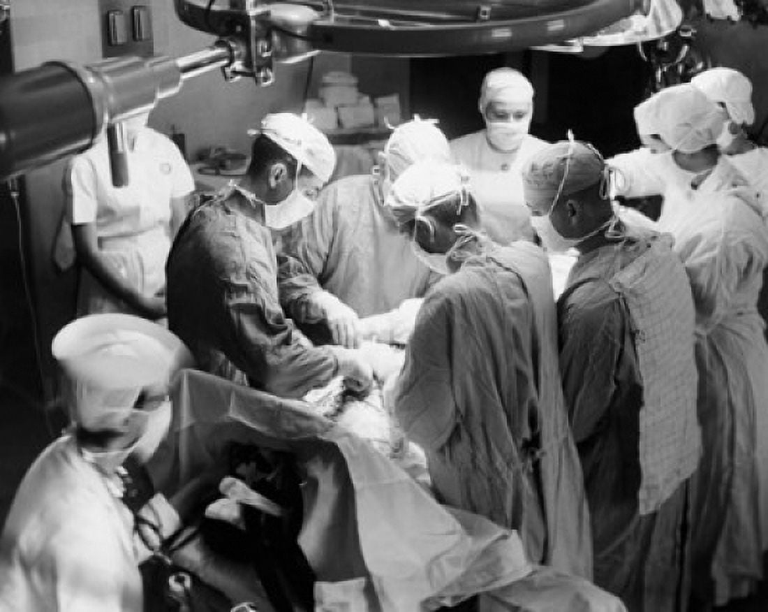High angle view of surgeons performing a surgery in an operating room Canvas Art - (18 x 24)