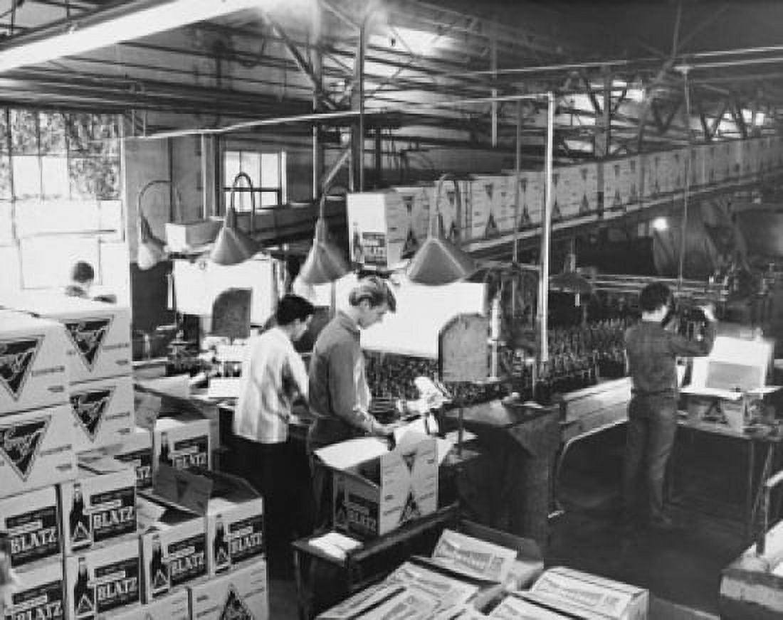High angle view of three male workers working in a glass bottle manufacturing plant Canvas Art - (18 x 24)