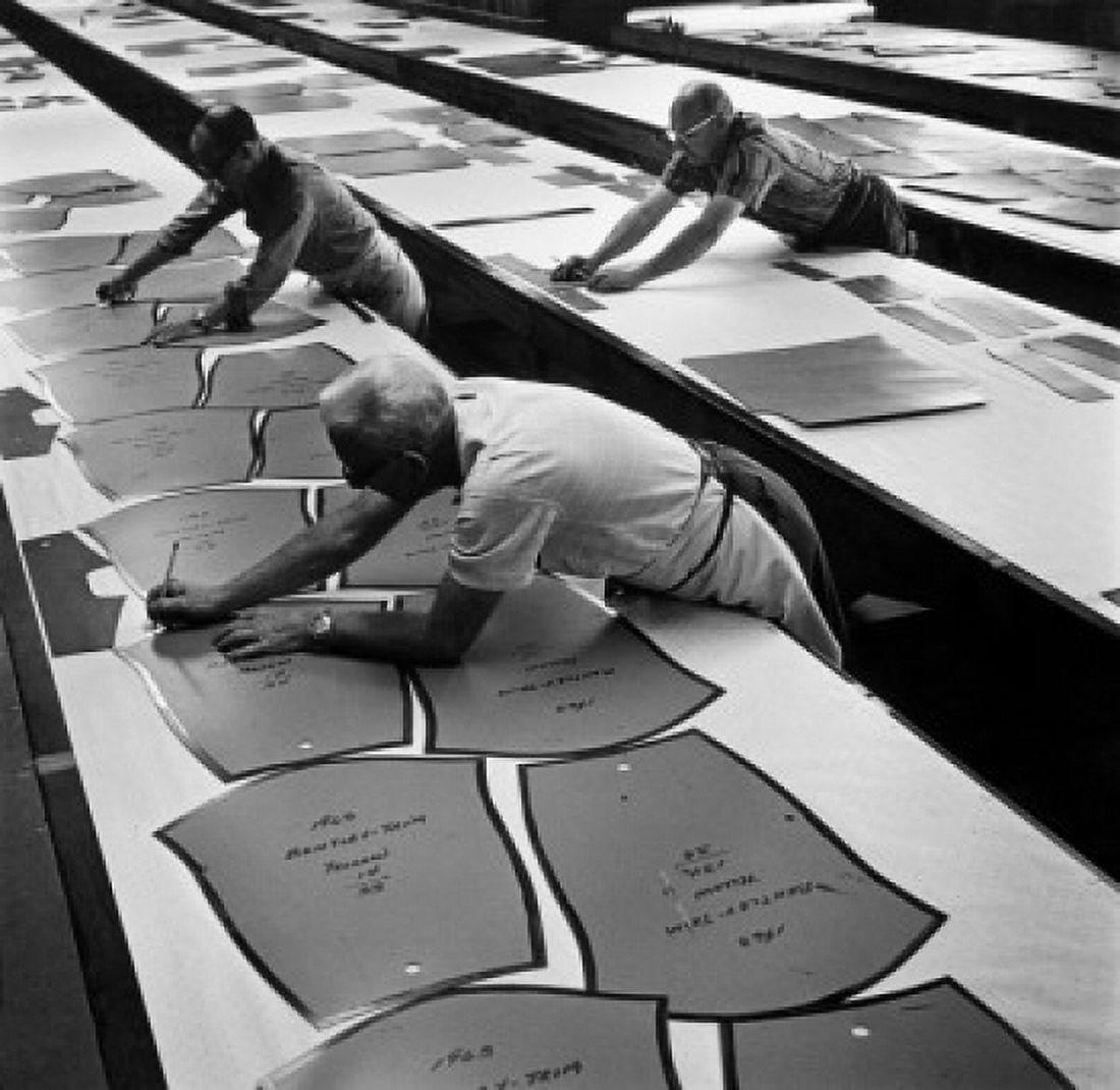 High angle view of three workers in a textile factory 1963 Canvas Art - (18 x 24)