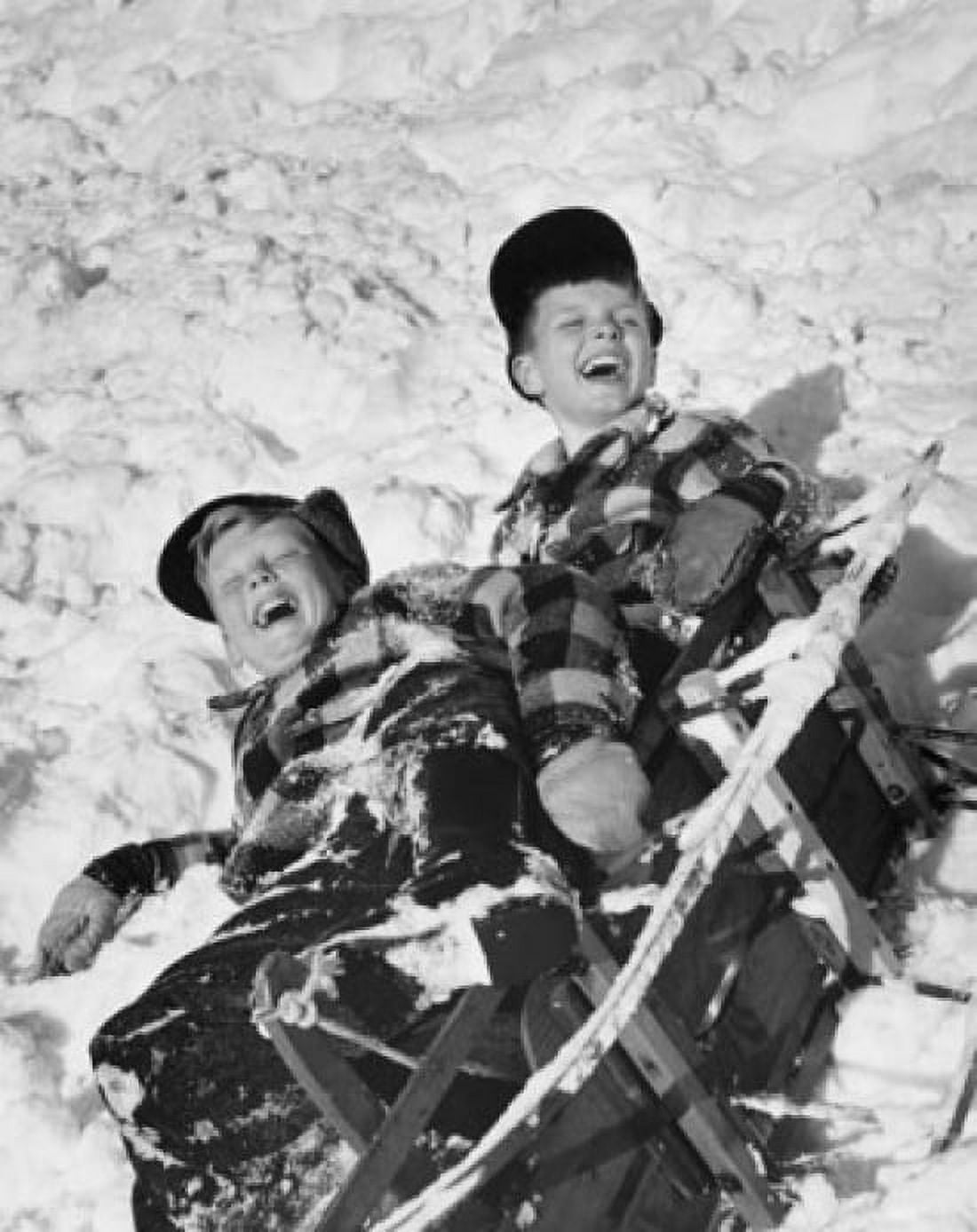 High angle view of two boys falling of sled Canvas Art - (18 x 24)
