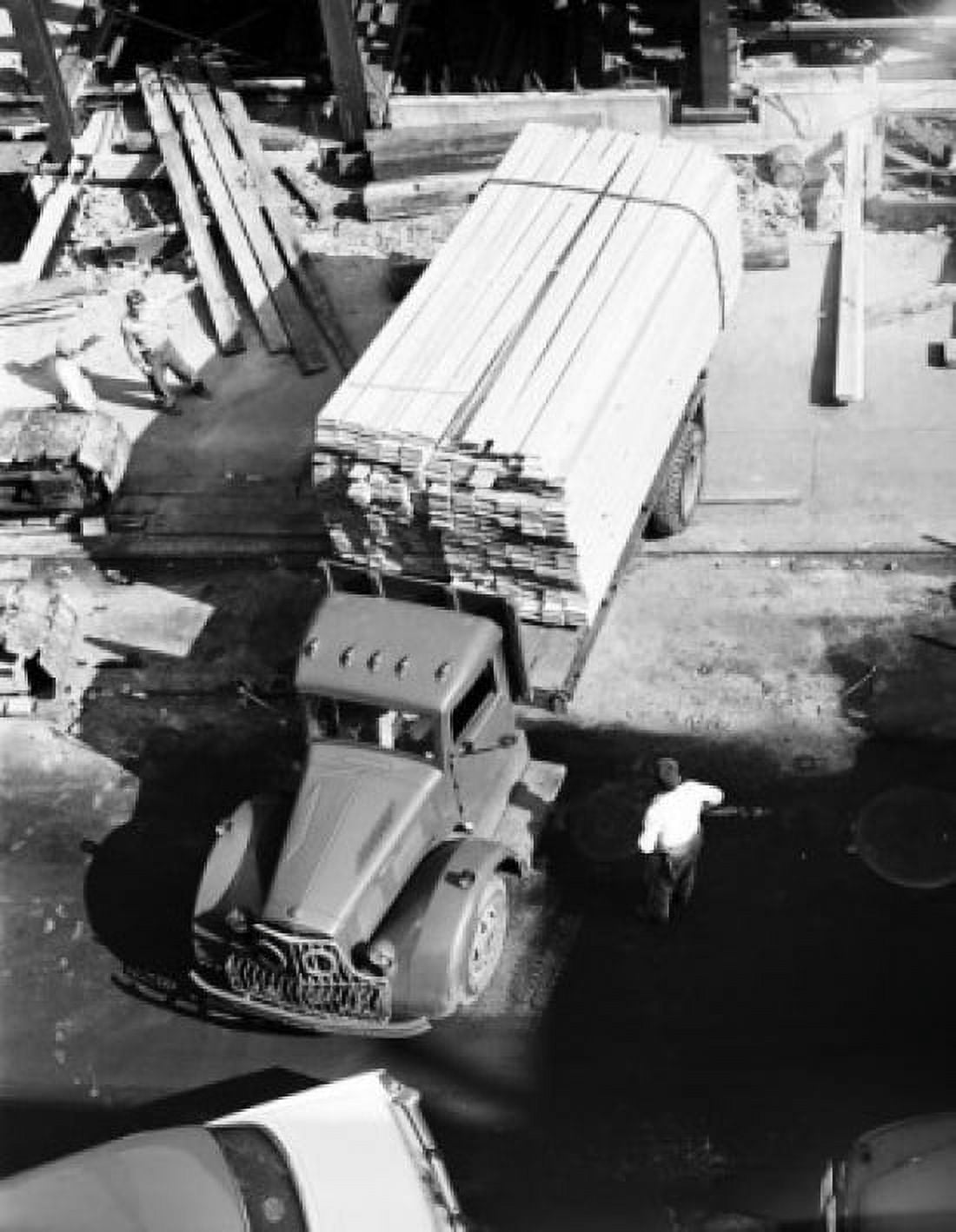 High angle view of two people standing beside a truck Canvas Art -  (24 x 36)