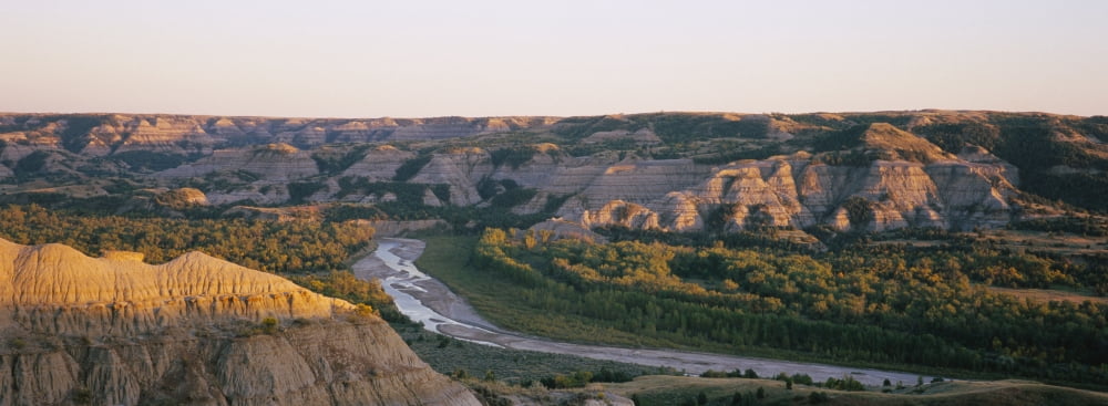 High angle view of a river passing through a landscape Little Missouri River Badlands Theodore Roosevelt National Park North Dakota USA Canvas Art - Panoramic Images (27 x 9)