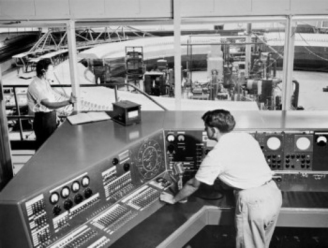 High angle view of scientists working in a control room of a laboratory Brookhaven National Laboratory Upton Long Island New York State USA Canvas Art - (24 x 36)