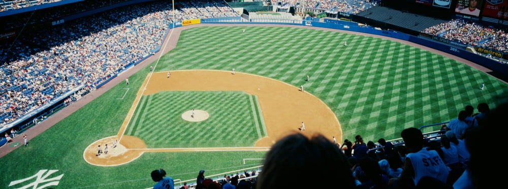 High angle view of spectators watching a baseball match in a stadium Yankee Stadium New York City New York State USA Canvas Art - Panoramic Images (12 x 30)