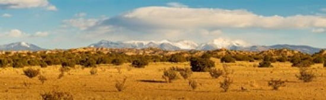 High desert plains landscape with snowcapped Sangre de Cristo Mountains in the background New Mexico USA Canvas Art - Panoramic Images (18 x 6)