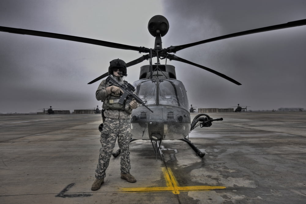 High dynamic range image of a pilot in front of a OH-58D Kiowa Canvas Art - Terry MooreStocktrek Images (18 x 12)