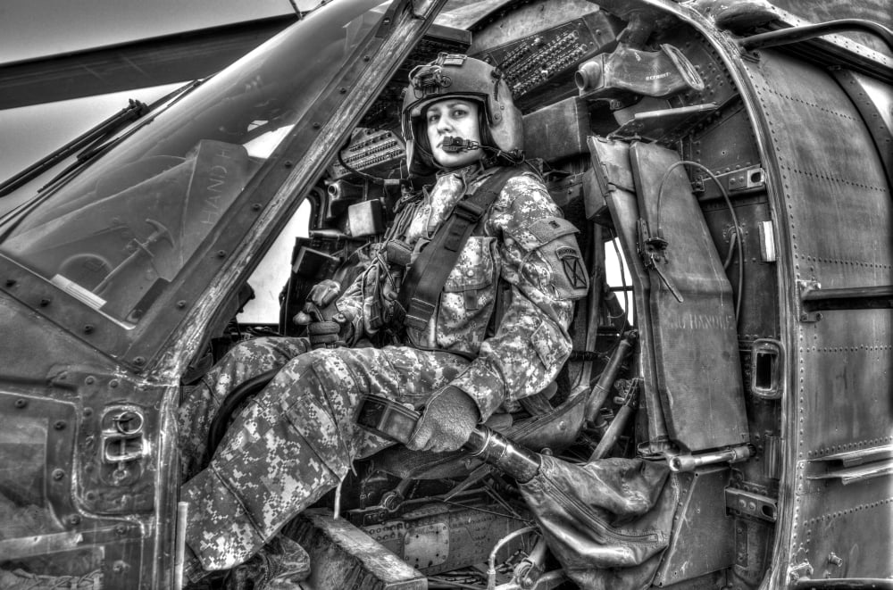 High dynamic range image of a woman pilot sitting inside of a UH-60 Black Hawk Canvas Art - Terry MooreStocktrek Images (18 x 12)