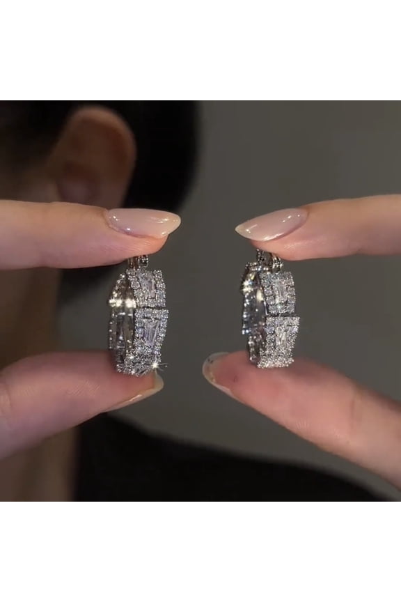 High-end, sparkling diamond earrings with Korean design are luxurious yet stylish, perfectly complementing any outfit and perfect for everyday wear.