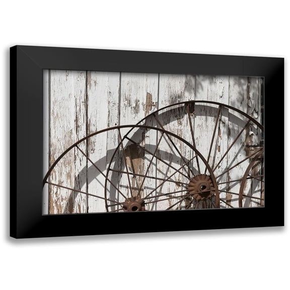 Highmith, Carol 14x11 Black Modern Framed Museum Art Print Titled - Old wagon wheels against a shed in Buffalo Gap Historic Village, near Abilene, TX