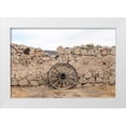 thumbnail image 1 of Highmith, Carol 14x11 White Modern Wood Framed Museum Art Print Titled - Wagon wheel against a stone fence at Hueco Tanks State Park, northwest of El Paso, TX, 1 of 4