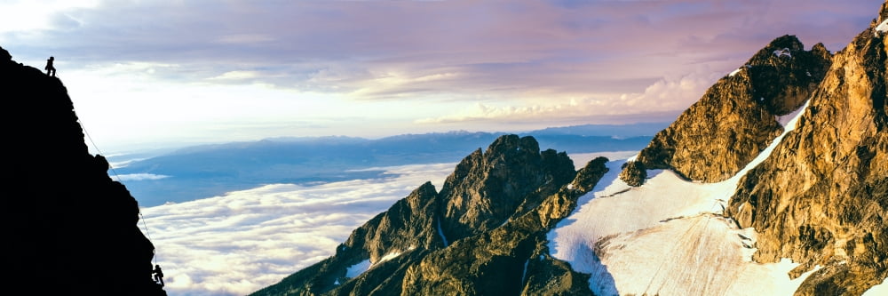 Hiker at cliff Jackson Hole Grand Teton National Park Wyoming USA Canvas Art - Panoramic Images (27 x 9)