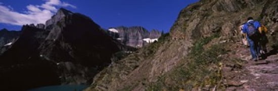 Hikers hiking on a mountain US Glacier National Park Montana USA Canvas Art - Panoramic Images (36 x 12)