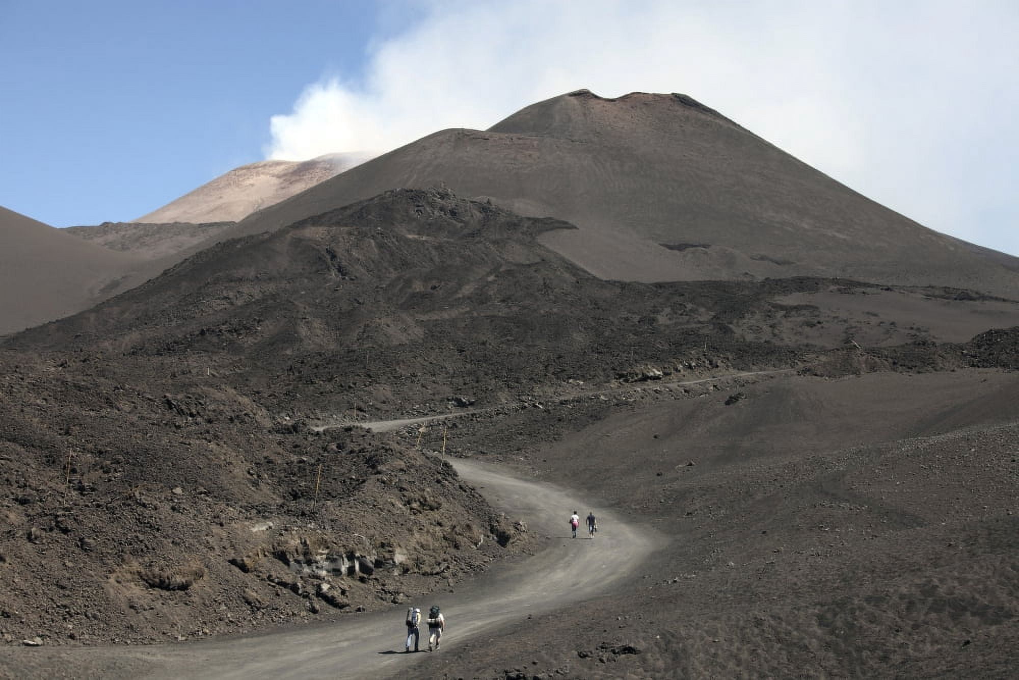 Hikers walking towards summit area of Mount Etna volcano Sicily Italy Canvas Art - Richard RoscoeStocktrek Images (18 x 12)