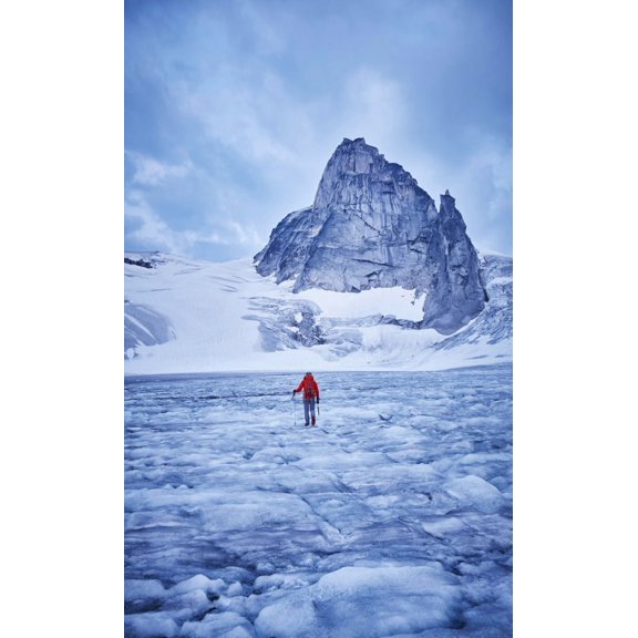 Hiking towards the West Ridge of Pigeon Spire route in the Bugaboos Provincial Park at dawn; British Columbia, Canada Poster Print (12 x 19)