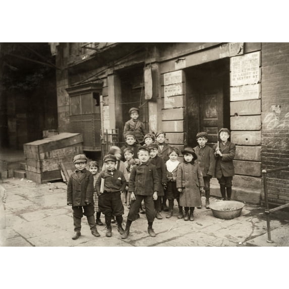 Hine Children 1910. Na Group Of Young Street Children Waiting To Peek Inside The Stage Door Of A Movie Theater In The