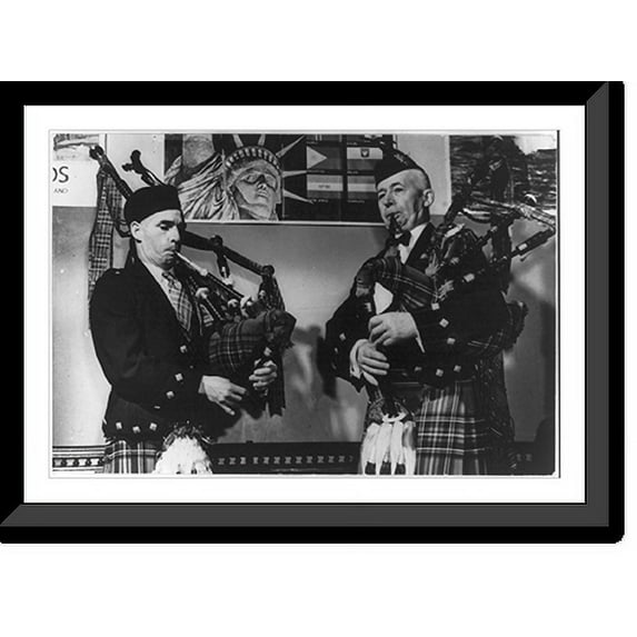 Historic Framed Print, [2 pipers playing their bagpipes in rehearsal for Scottish dances to be staged at the National Folk Festival, Philadelphia], 17-7/8" x 21-7/8"