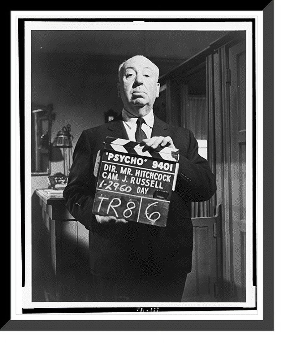 Historic Framed Print, [Alfred Hitchcock, three-quarter length portrait, standing on movie set ...