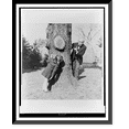 thumbnail image 1 of Historic Framed Print, [Arturo Toscanini playing with his granddaughter, Sonia Horowitz, by tree on lawn of his home in Riverdale, a suburb of New York City], 17-7/8" x 21-7/8", 1 of 9