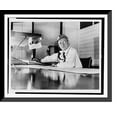 thumbnail image 1 of Historic Framed Print, Banana transportation. Tela Railroad Company. Don Pia Maradiaga (48 years on the job) gives orders. Honduras, 17-7/8" x 21-7/8", 1 of 9
