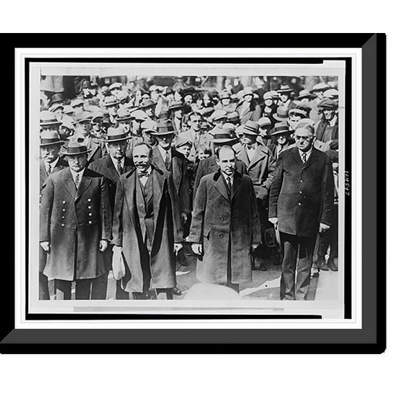 Historic Framed Print, [Bartolomeo Vanzetti (left) and Nicola Sacco, manacled together surrounded by heavy guard and onlookers, about to enter the courthouse at Dedham, Massachuset, 17-7/8" x 21-7/8"