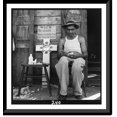 thumbnail image 1 of Historic Framed Print, [Catholic religious scenes in Puerto Rico, 1944-46: man on street whittling religious figures], 17-7/8" x 21-7/8", 1 of 9